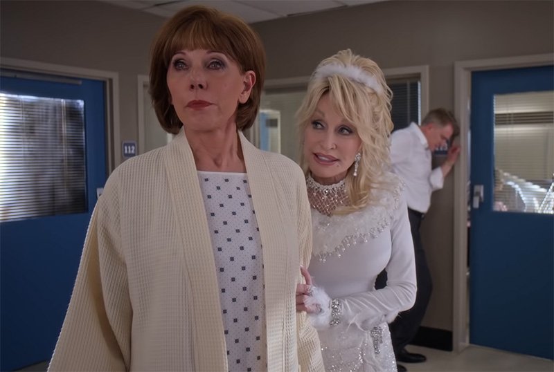 Trailer Watch: Christine Baranski Is a Major Scrooge in “Dolly Parton's  Christmas on the Square” | Women and Hollywood